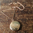 Load image into Gallery viewer, Round Locket with flower detail rosegold necklace