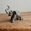 Load image into Gallery viewer, Miniature grey ceramic elephant trunk raised