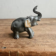 Load image into Gallery viewer, Miniature grey ceramic elephant trunk raised