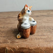 Load image into Gallery viewer, Ceramic brown cat playing drums