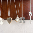 Load image into Gallery viewer, Flower Heart Necklace