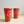Load image into Gallery viewer, Fair Trade Steel Tall Cup Orange Flower
